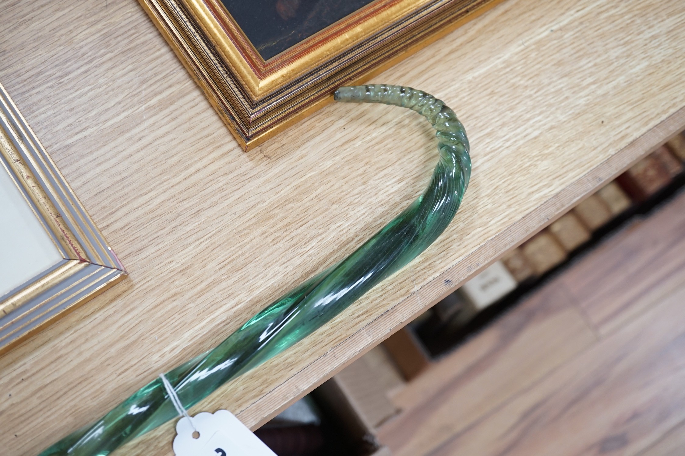 A Victorian green glass walking stick, 107cm
